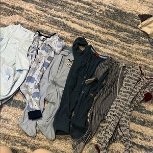 Boys Assorted Baby Onesies and Sleepers size 6-9 months. Carters,Bert’s bees etc